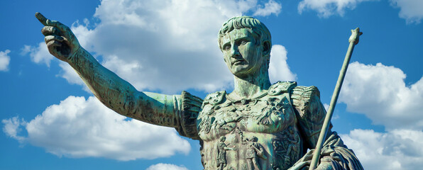 The roman emperor Gaius Julius Caesar statue in Rome, Italy. Concept for authority, domination,...