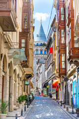 Fototapeta na wymiar Galata tower landmark, Istanbul street in Turkey