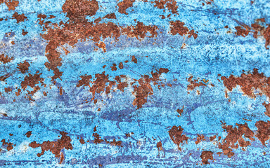 Grunge background, rough painted metal sheet with lots of rust stains, scratches