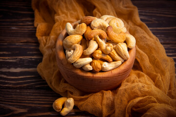 cashew nuts on wooden background