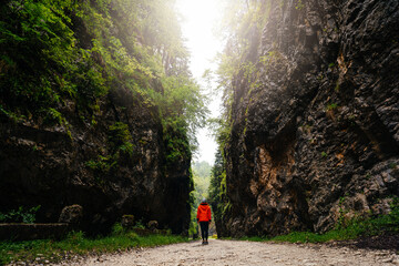 Man walking in rocky canyon