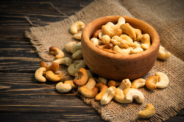 cashew nuts on wooden background