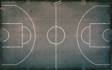 Aerial view of basketball court without players in public park - Powered by Adobe