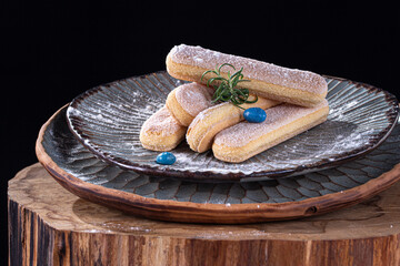 cookies on a beautiful plate on a black background