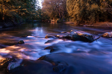 A rapid flowing river in the evening