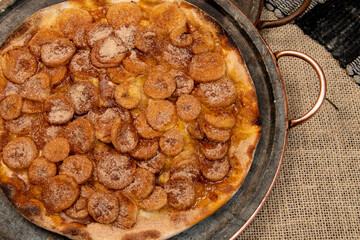Sweet Brazilian pizza with banana, cinnamon and sugar