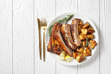 grilled pork ribs served with roast new potatoes