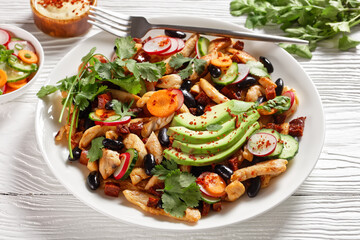 Mexican salad of black beans, chicken, and radish