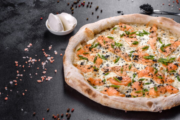 Tasty sliced pizza with seafood and tomato on black background