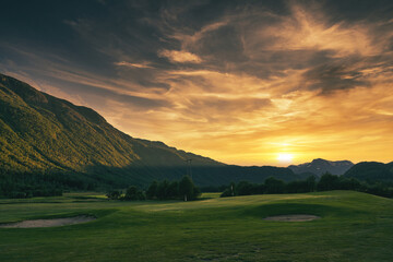 Fototapeta premium Wild mountains of Hemsedal. The nature is wild and the scenery is set. Golden hour light and dramatic sky. Country life here is not bad. 