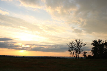 Fototapeta na wymiar Sunset over farmland in Poland.