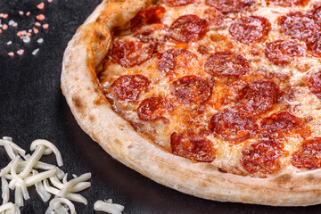 Pepperoni pizza with pizza sauce, mozzarella cheese and pepperoni