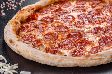 Pepperoni pizza with pizza sauce, mozzarella cheese and pepperoni