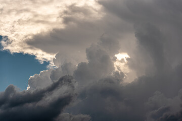 huge storm cloud, tower cumulus and cumulonimbus cloud, develop over Alp mountains