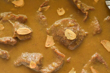 Sliced beef steak with mushroom sauce food background