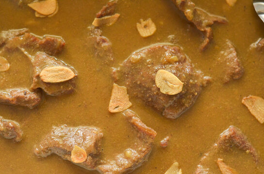 Sliced beef steak with mushroom sauce food background
