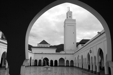 Fototapeta na wymiar The mausoleum of Moulay Idriss II in Morocco in black and white