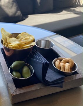 a selection of Horderves on a square plate.