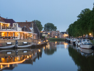 Fototapeta na wymiar Beautiful lidle village in Friesland, Netherlands