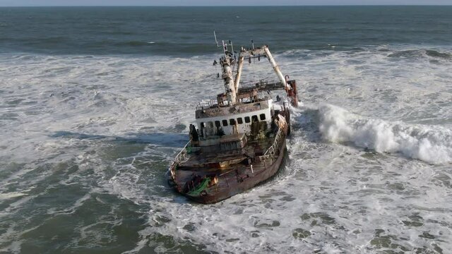 Aerial orbiting shot of Zeila Shipwreck on the Skeleton Coast near Henties Bay in Namibia, Africa.