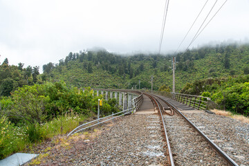 Fototapeta na wymiar Train tracks at the old coach road, New Zealand