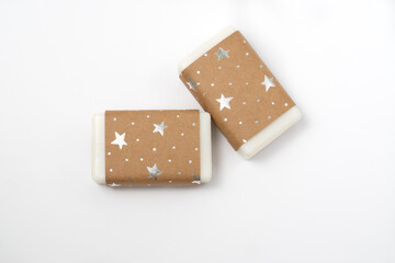 handmade craft soap in craft packaging on a white background