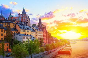 Stockholm, Sweden. Scenic summer sunset view with colorful sky of the Old Town architecture in...