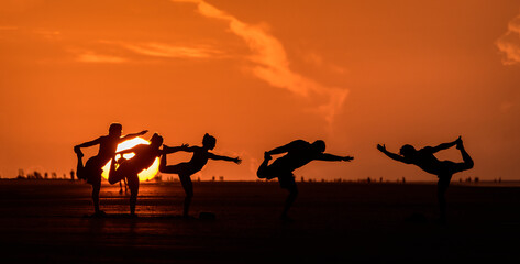 Fototapeta na wymiar Sunrise Beach Yoga