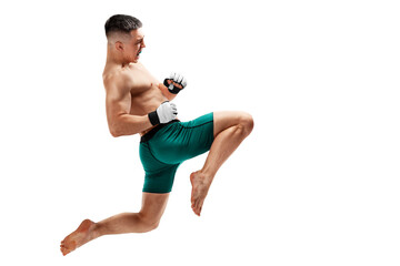 Fototapeta na wymiar MMA. Jumping knee kick. Male fighter jumping with a knee kick. Sport. Isolated