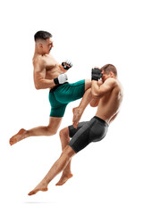 MMA. Knee kick to the head. Two fighters are fighting. Jump kick. Sport action concept. Isolated