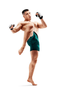 MMA. Knee kick. Male fighter with a knee kick. Sport. Isolated in white background