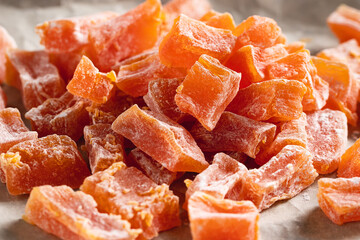 Cooking Natural farm homemade candied pumpkin fruits sprinkled with powdered sugar