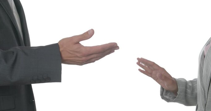 Businesswoman refusing to shake hands with colleague on white background