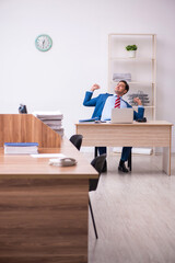 Young businessman employee working in the office