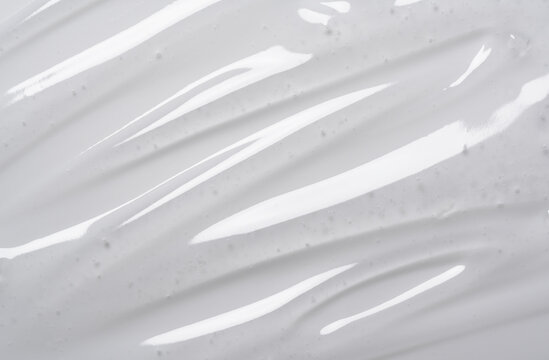 Serum texture on transparent liquid gel background.