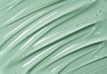 Serum texture on transparent liquid gel background with green background.