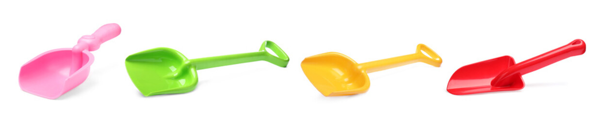 Different bright plastic toy shovels on white background, collage. Banner design