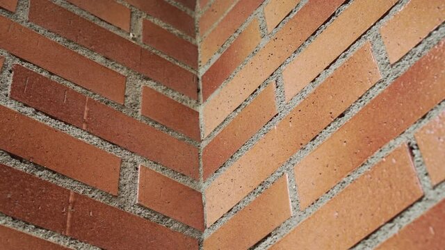 Corner of a brick wall close up. Dolly Shot