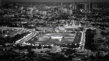 Black And White Royal crematorium. The royal pyre for royal funeral of H.M. King Bhumibol Adulyadej at Sanamlaung, Bangkok, Thailand. Long exposure, Moving crowd.	