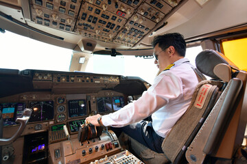 Airline pilot work in the cockpit	
