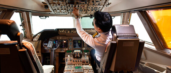 Airline pilot work in the cockpit	