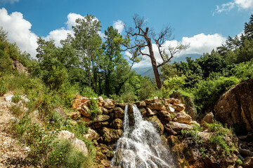 Fototapeta na wymiar Beautiful waterfall, untouched nature, beautiful view.