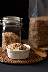 Organic brown rice harvested from the fields of northern Thailand. Rich in vitamins and fiber, which are beneficial to health. natural product concept