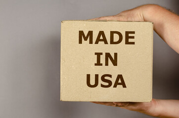 A box of American goods on a gray background.