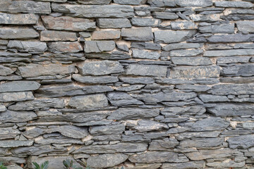 Masonry wall texture of old stones