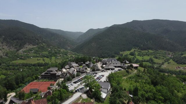 Drvengrad Village on Mecavnik Hill, Mokra Gora, Serbia. Drone Aerial View, Small Ethnic Timber Town in Green Serbian Mountain Landscape