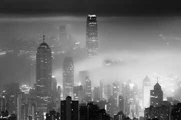 Fog over Hong Kong city at night