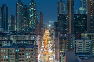 Night scenery of busy street in downtown district of Hong Kong city