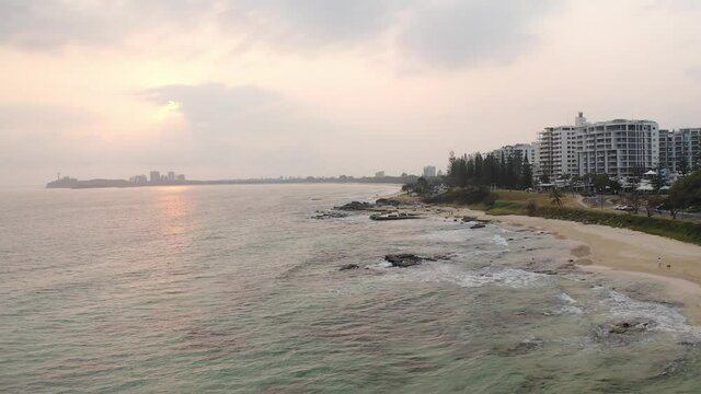 Reflection Of Sunlight At The Waterscape Of Mooloolaba Beach At Dusk In QLD, Australia. aerial