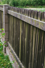 Fence built from wood. Outdoor landscape. Security and privacy concept.